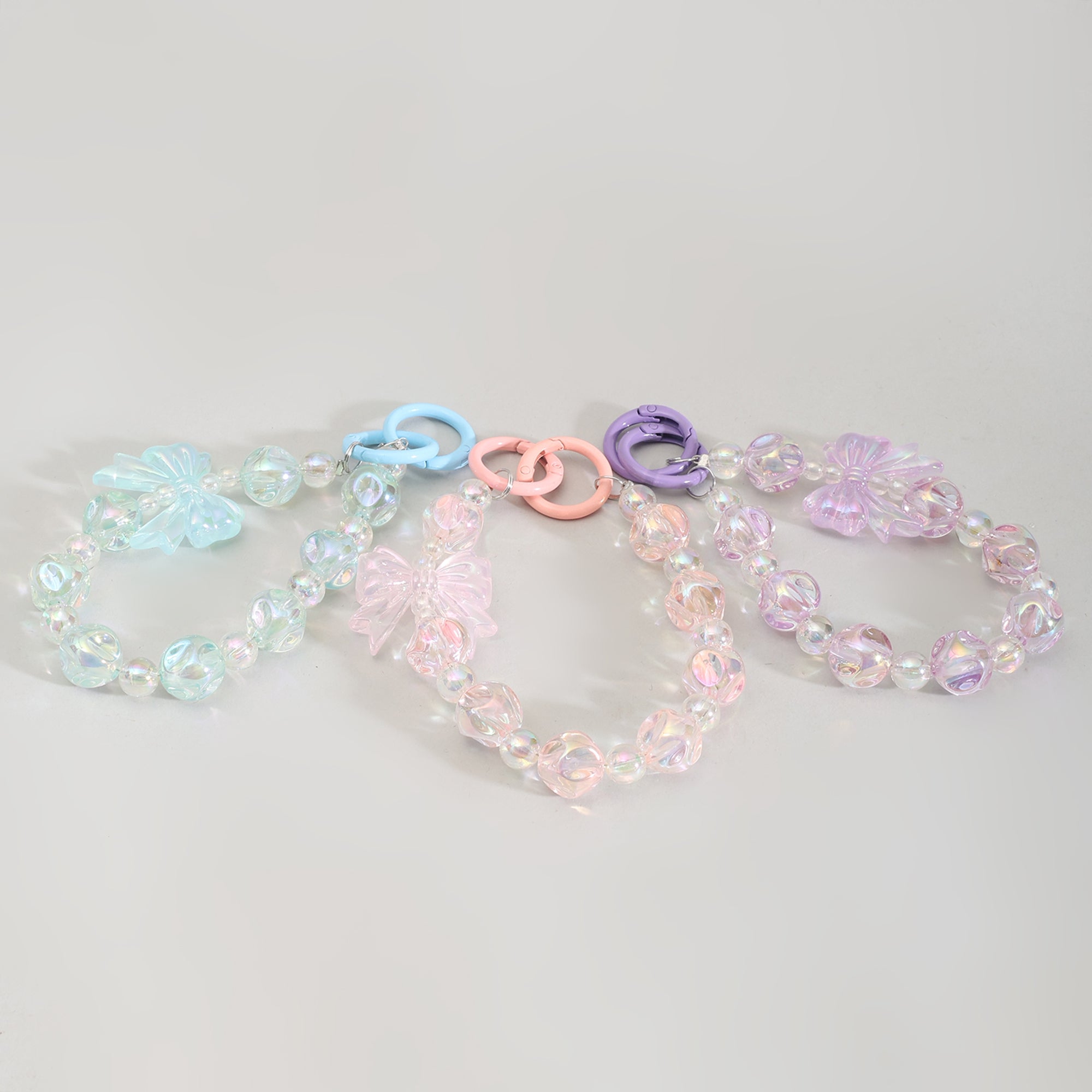 Mumuso Beaded Cellphone Wrist Strap with Crystalline Bowknot- Assorted Colours