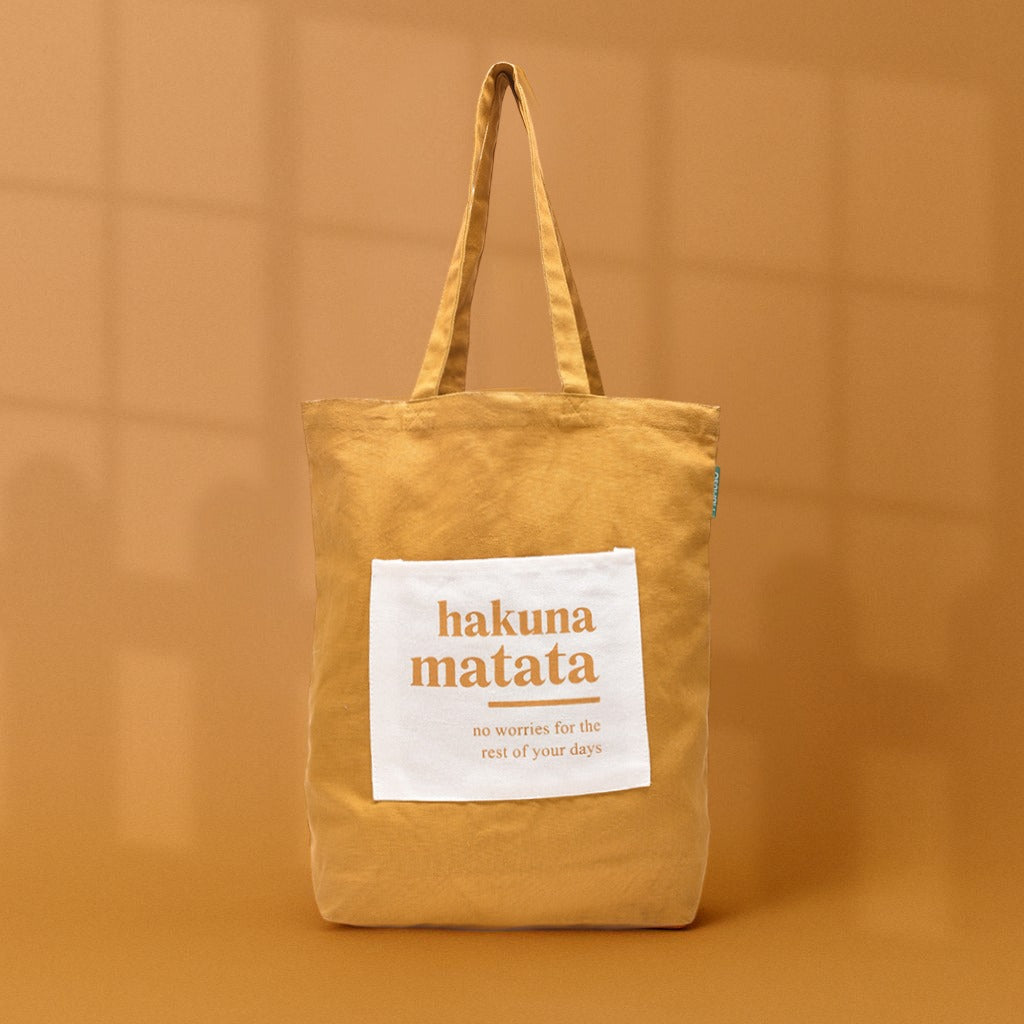 Mumuso "Hakuna Matata" Tote Bag - Dark Amber