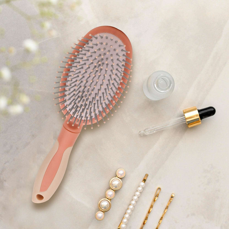 Effortless Styling Oval Pink Air Cushion Hair Brush Mumuso