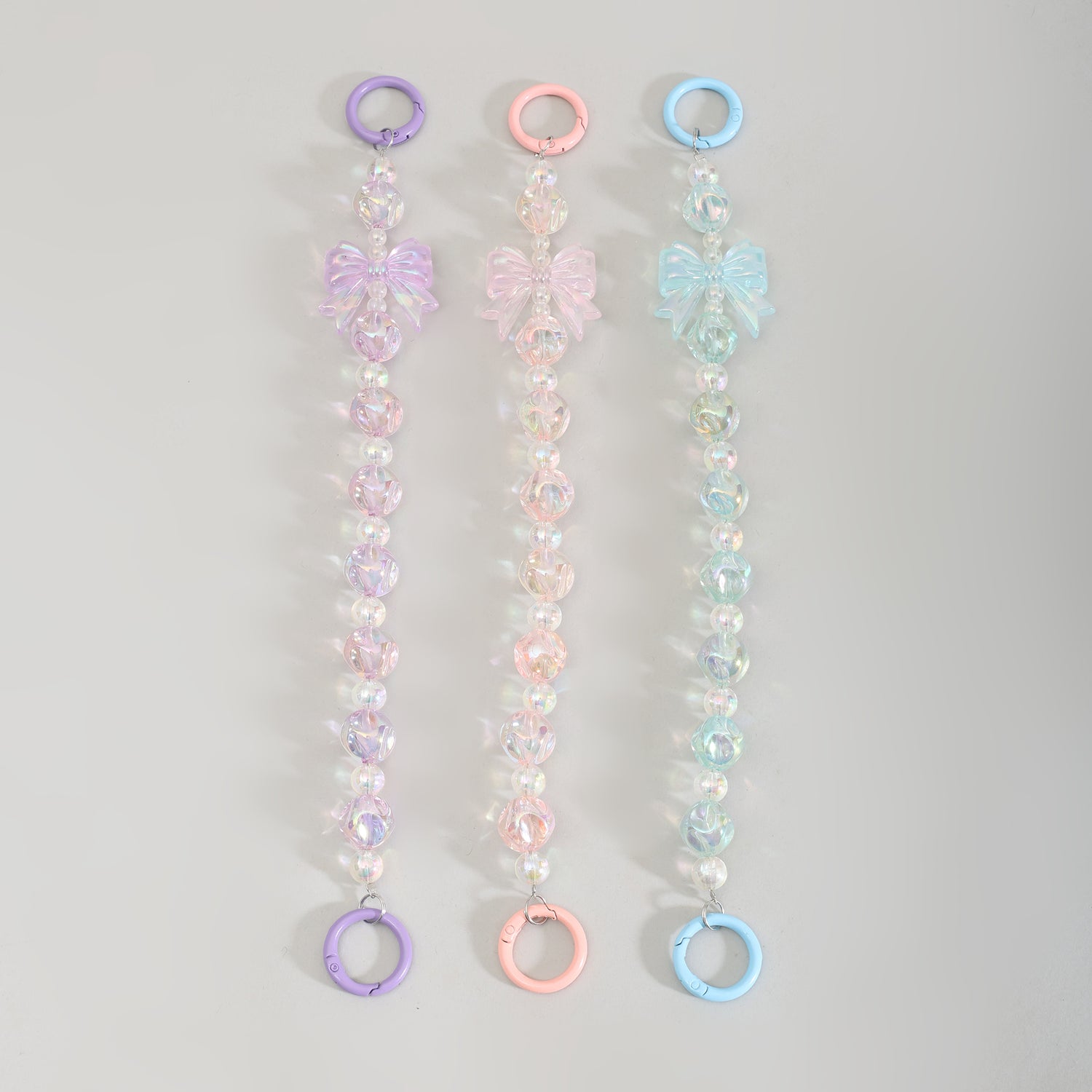 Mumuso Beaded Cellphone Wrist Strap with Crystalline Bowknot- Assorted Colours