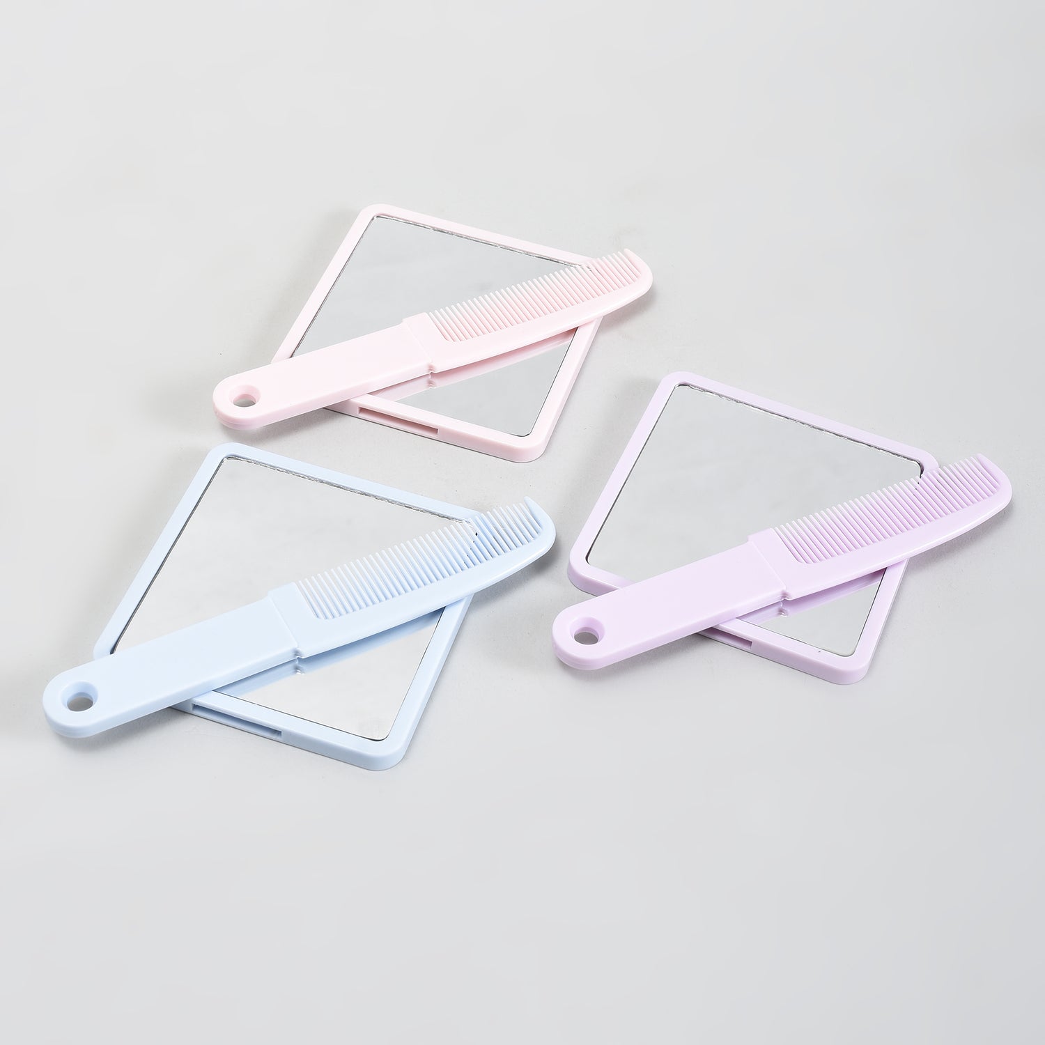 Mumuso Handheld Mirror &amp; Hair Comb 2-in-1 Combo  — Blue/ Pink/ Purple