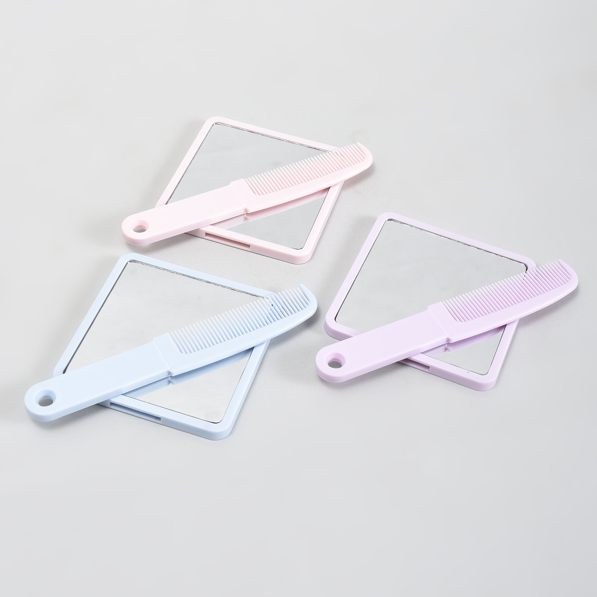 Mumuso Handheld Mirror &amp; Hair Comb 2-in-1 Combo  — Blue/ Pink/ Purple