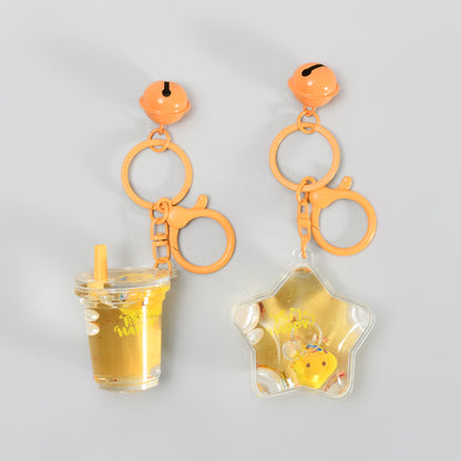 Unsinkable Capybara Transparent Keychain with Decorative Bell - Milk Tea Cup / Star