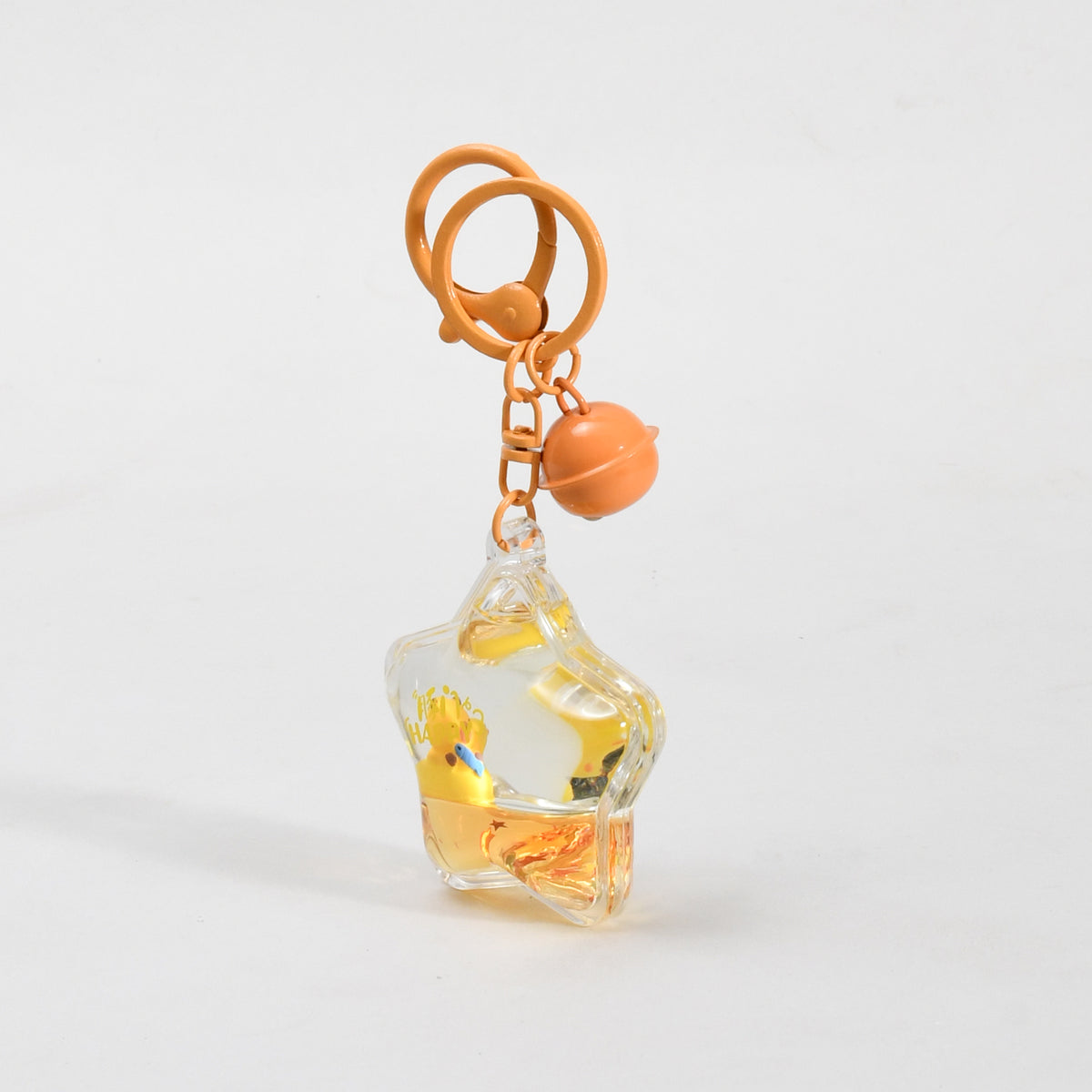 Unsinkable Capybara Transparent Keychain with Decorative Bell - Milk Tea Cup / Star