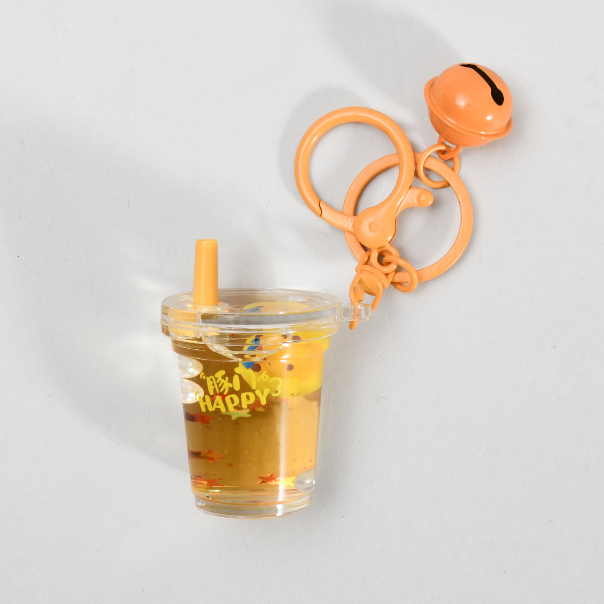 Unsinkable Capybara Transparent Keychain with Decorative Bell - Milk Tea Cup / Star