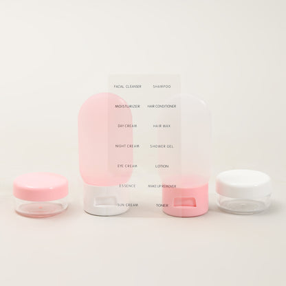 4-Piece Mini Travel Bottles Set — Pink and White Edition